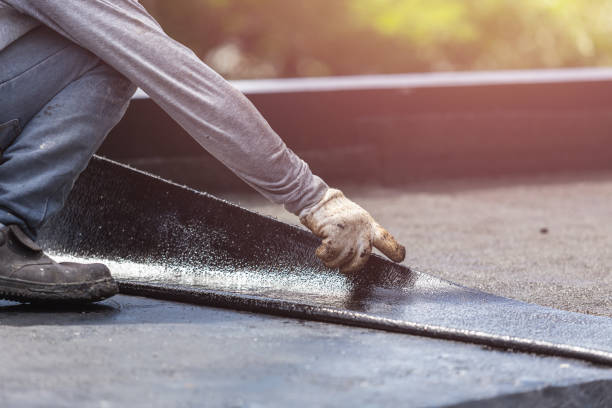 Professional Basement Waterproofing technician working in Charlotte, NC